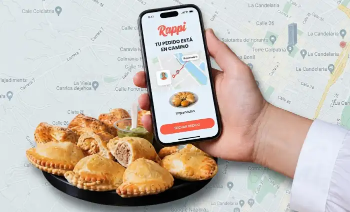 Celular con app de Rappi confirmando pedido a domicilio de empanadas Doña Dicha.
